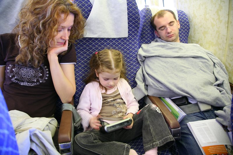 A family travelling together at an airport