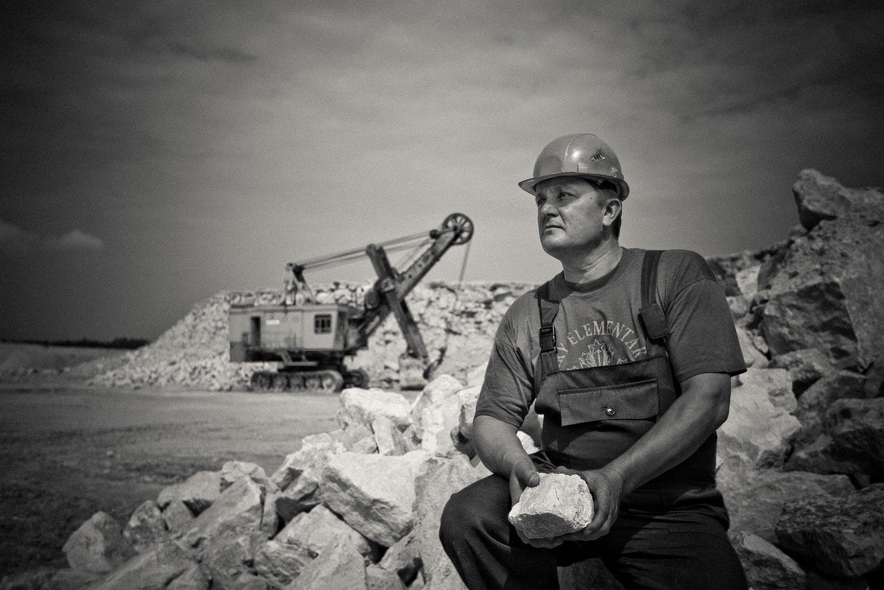 Construction worker wearing a hard hat at a project site