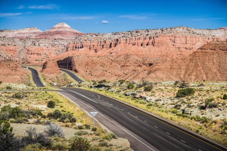 Desert highway winding through mountainous terrain in Saudi Arabia