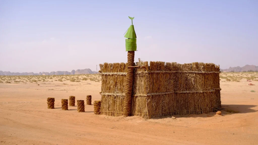 Straw hut standing in the sand of the AlUla desert