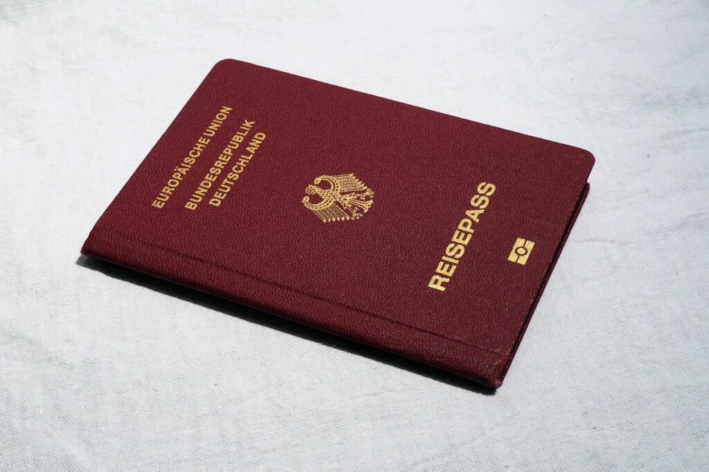 A passport and boarding pass, representing entry document preparation