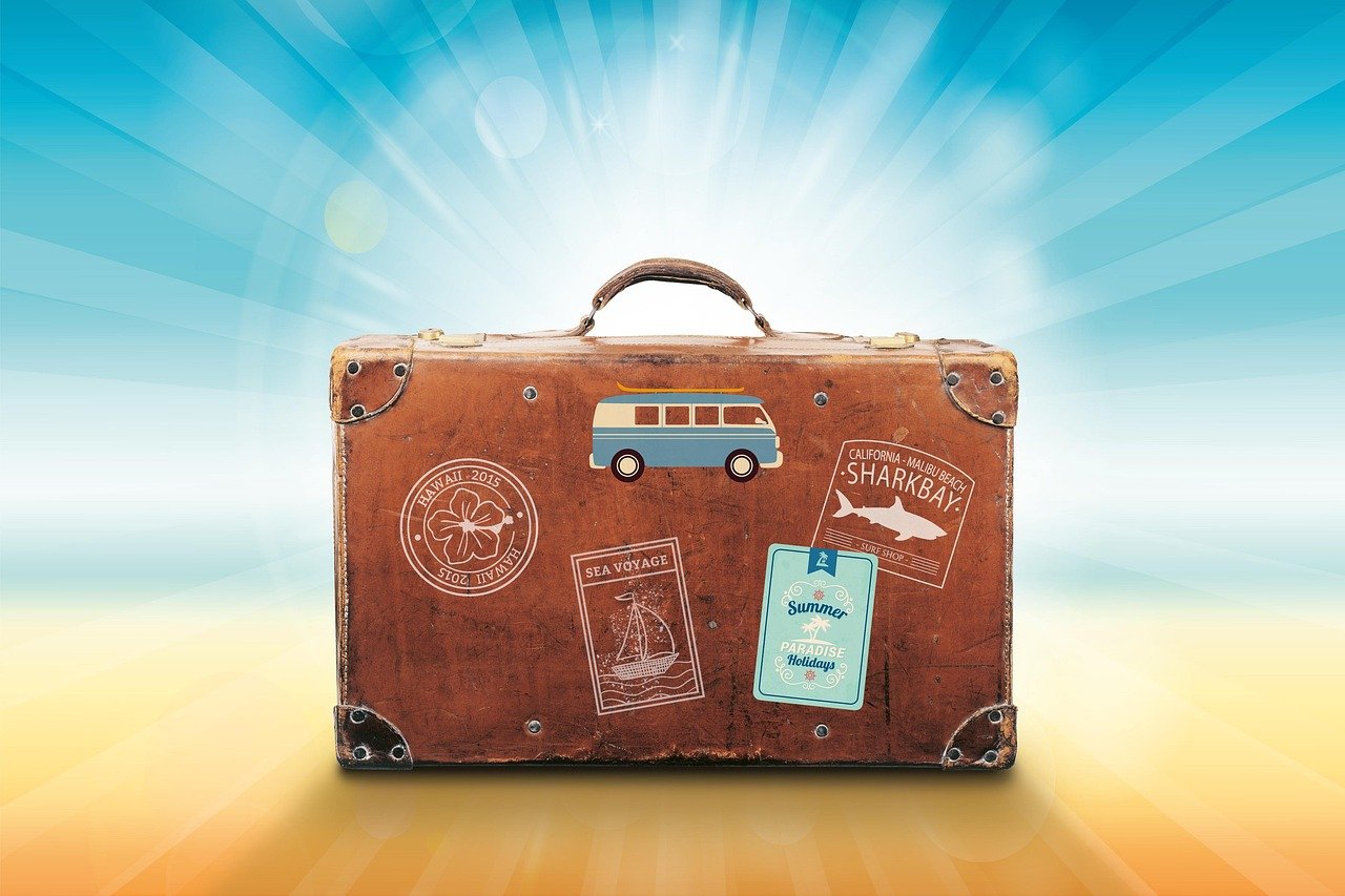 A family with luggage arriving at a Saudi Arabian airport during a busy holiday period