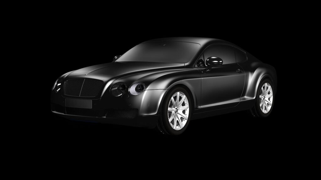 Chauffeur driven luxury sedan waiting at an airport terminal for a VIP pickup