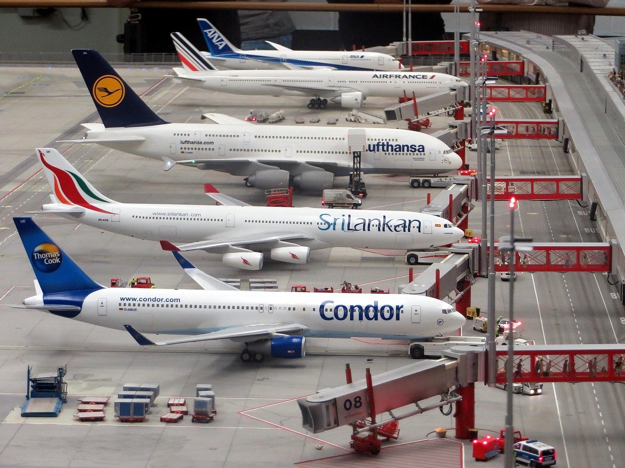 Passenger looking at a departures board at a Saudi domestic airport terminal