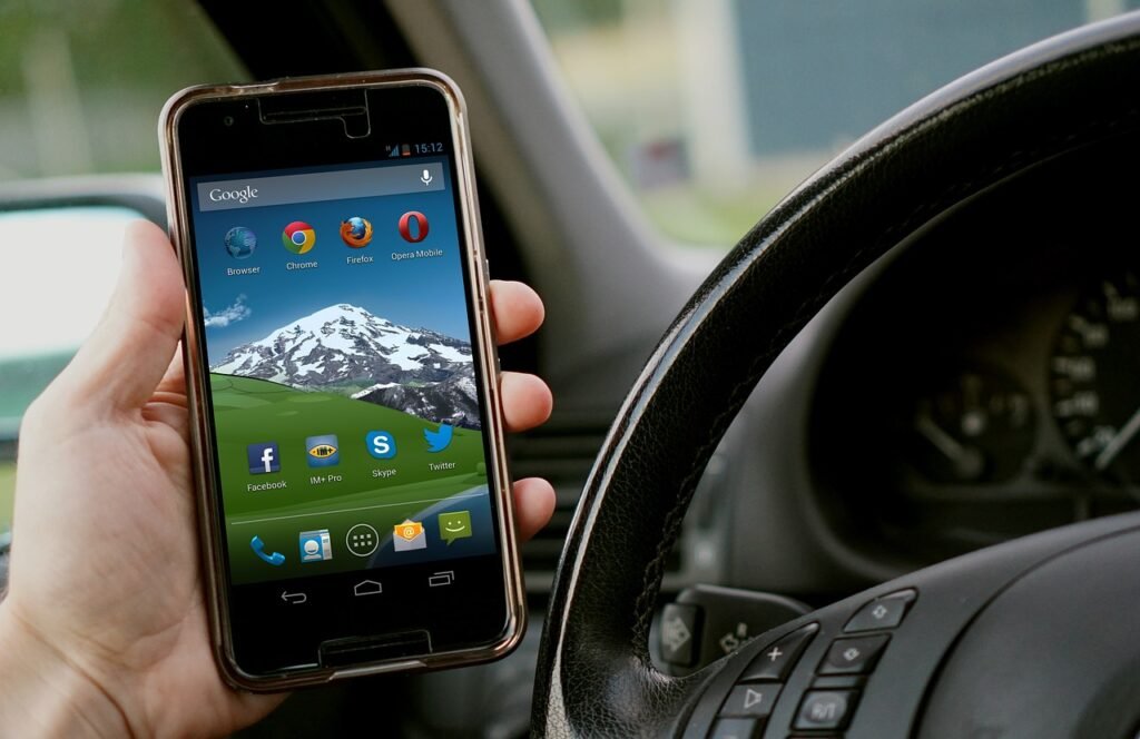 Businessman Using Phone Car - Saudi Cab Co ground transport guide