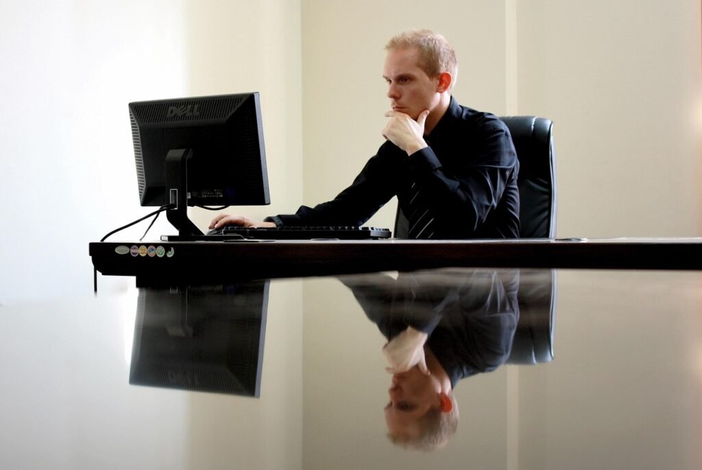 Business professional in formal suit attending a corporate meeting in Saudi Arabia