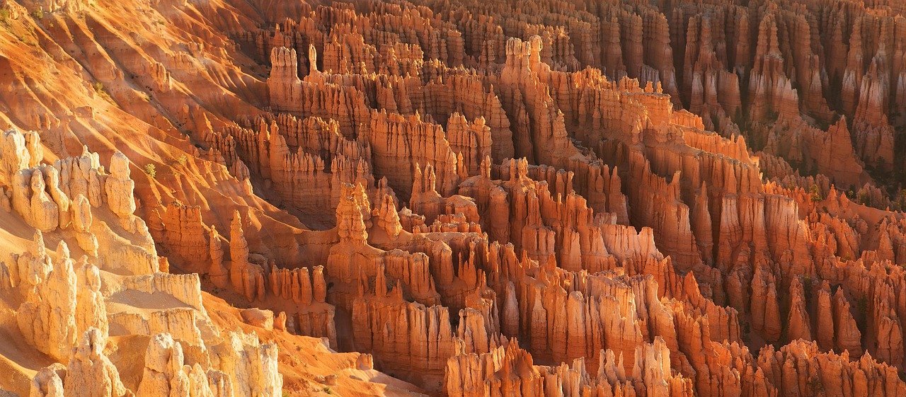 Sandstone rock formations typical of the AlUla region (wider view)