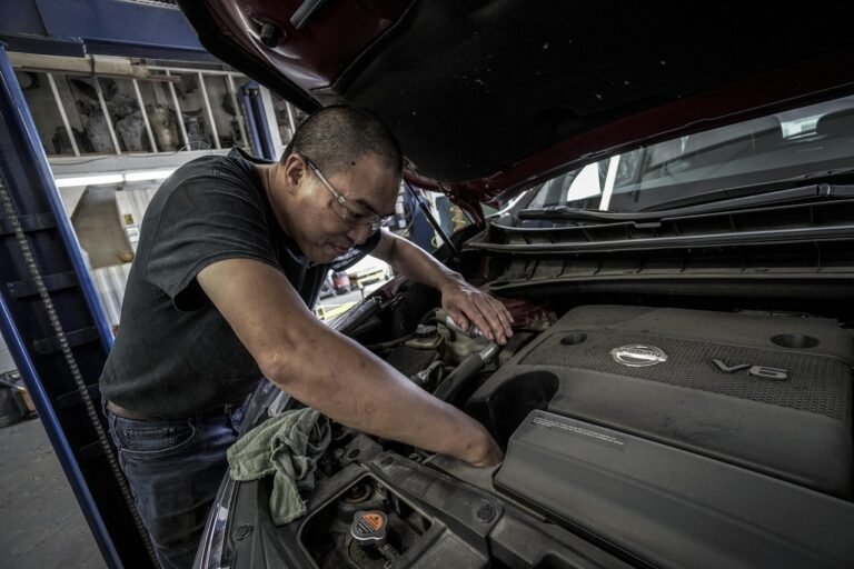 A vehicle safety check, representative of professional transport standards