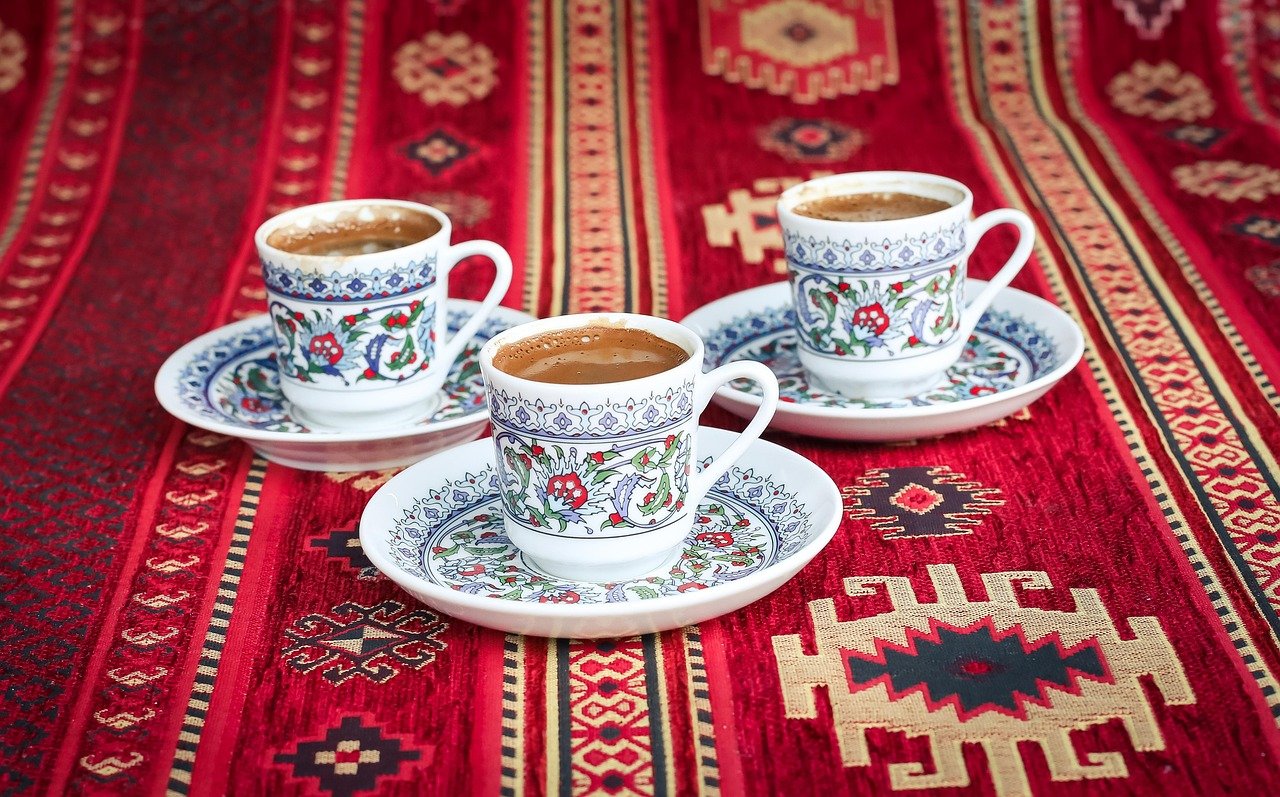 Arabic coffee and dates served during a formal business meeting in Saudi Arabia
