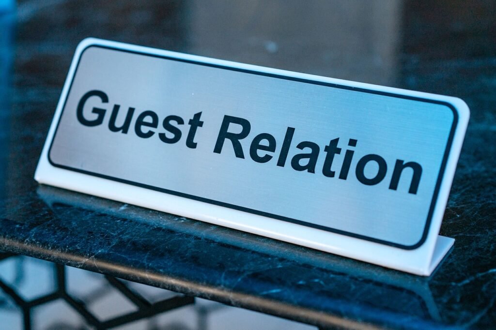 Hotel concierge desk where a guest is arranging onward transport