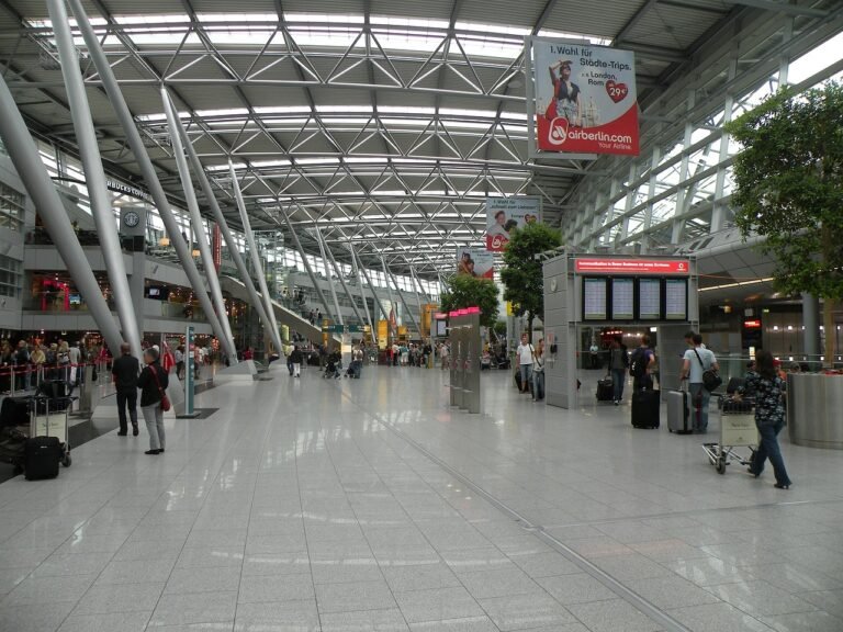Arrivals area at a modern Saudi Arabian airport terminal